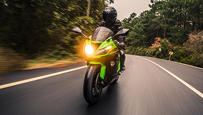 Driving green neon color motorcycle road dusk time