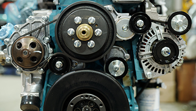 Close up of working engine of huge industrial machine