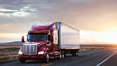 Front view of a commercial truck on the road